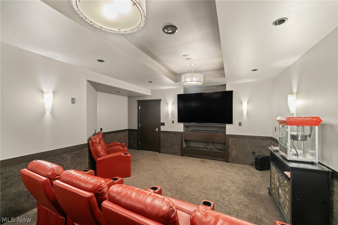 6716 Kyle Ridge Pointe Canfield, OH 44406 - Photo 39 of 43 Theatre room featuring a raised ceiling and carpet