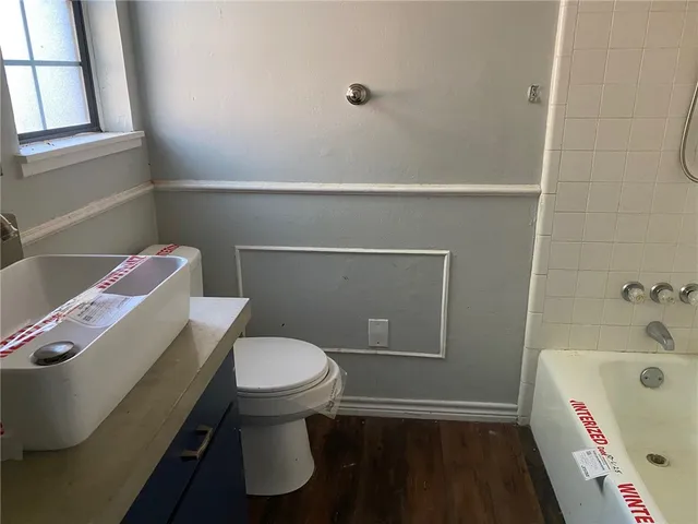 a bathroom with a sink and a toilet