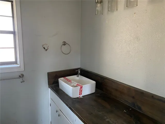 a view of a house with a tree