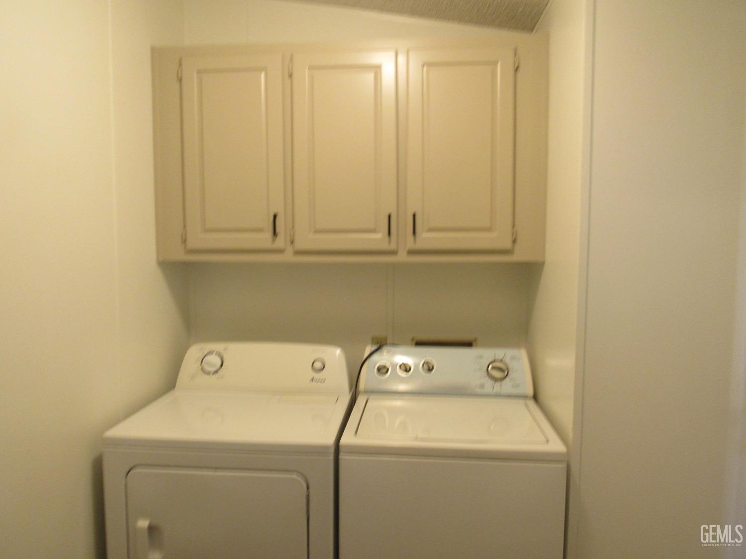 Undisclosed Address Bakersfield, CA 93304 - Photo 17 of 26 a utility room with dryer and washer