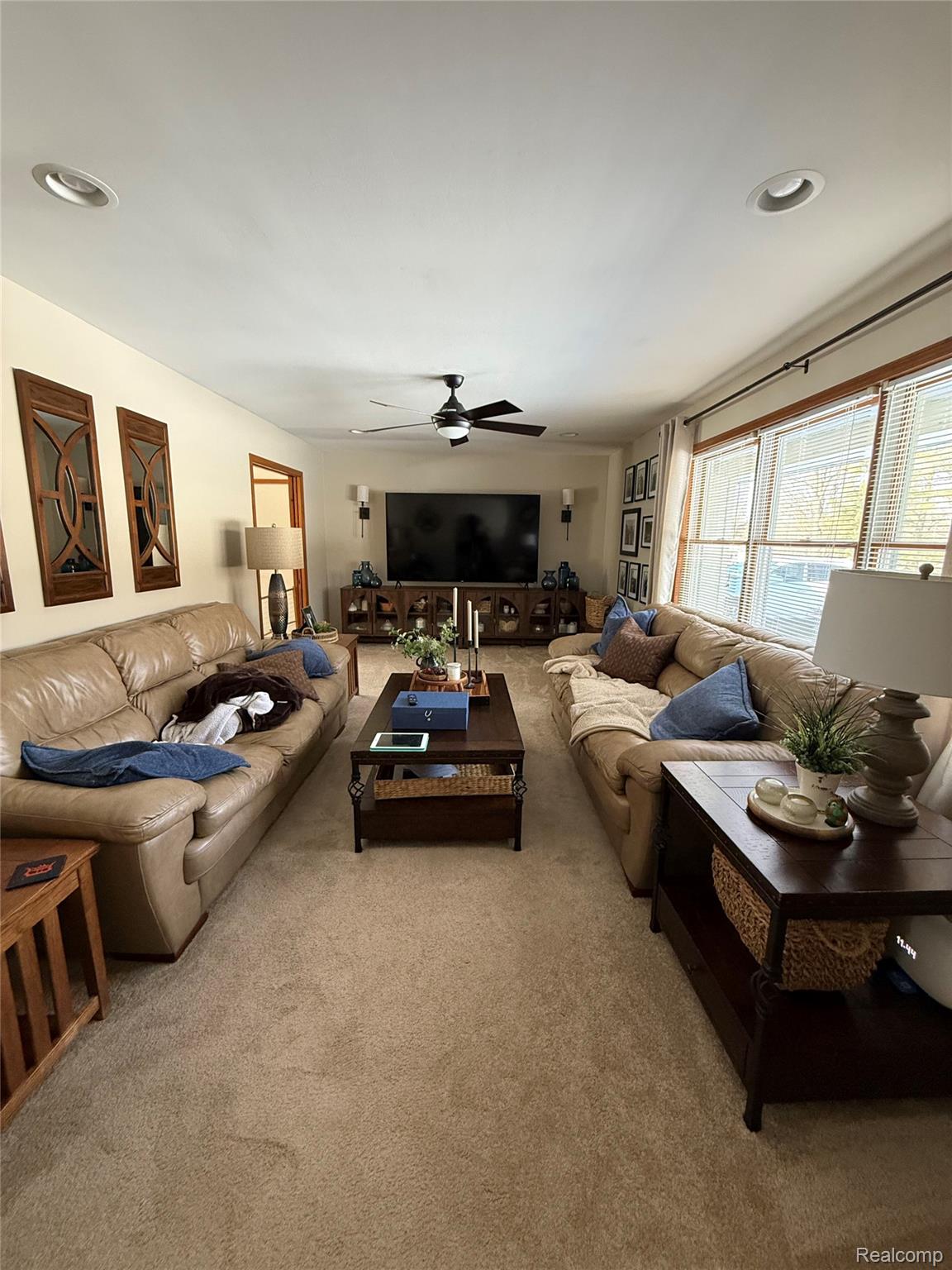 3668 East Allen Road Howell, MI 48855 - Photo 3 of 18 Carpeted living space featuring recessed lighting and a ceiling fan