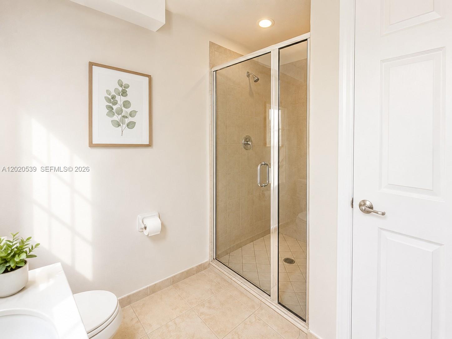 17001 Southwest 96th Street Miami, FL 33196 - Photo 9 of 23 a bathroom with a shower and a toilet