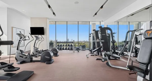 a view of a room with gym equipment