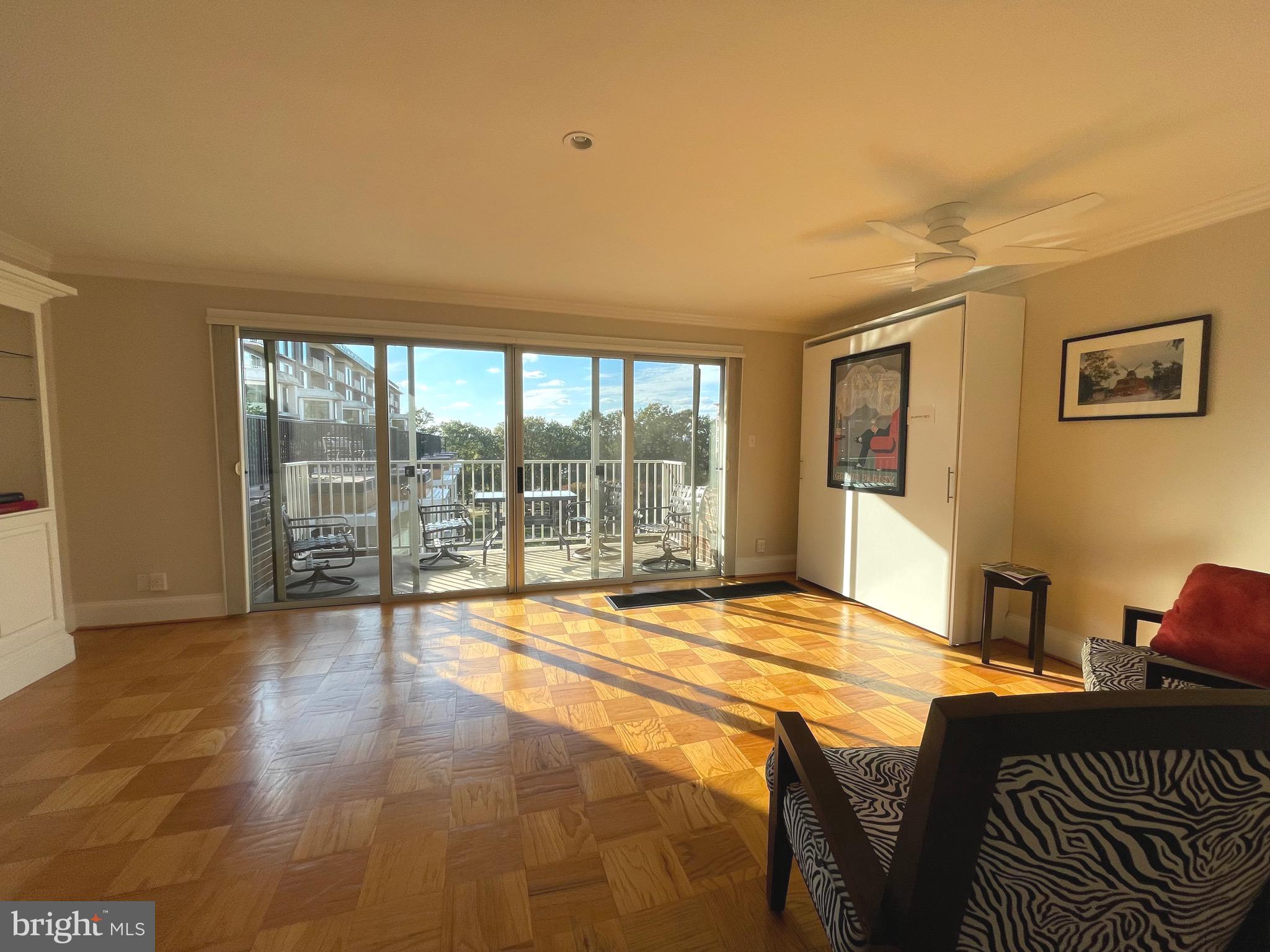 520 N Street Southwest, Unit S618 Washington, DC 20024 - Photo 1 of 62 a bed sitting in a bedroom next to a window