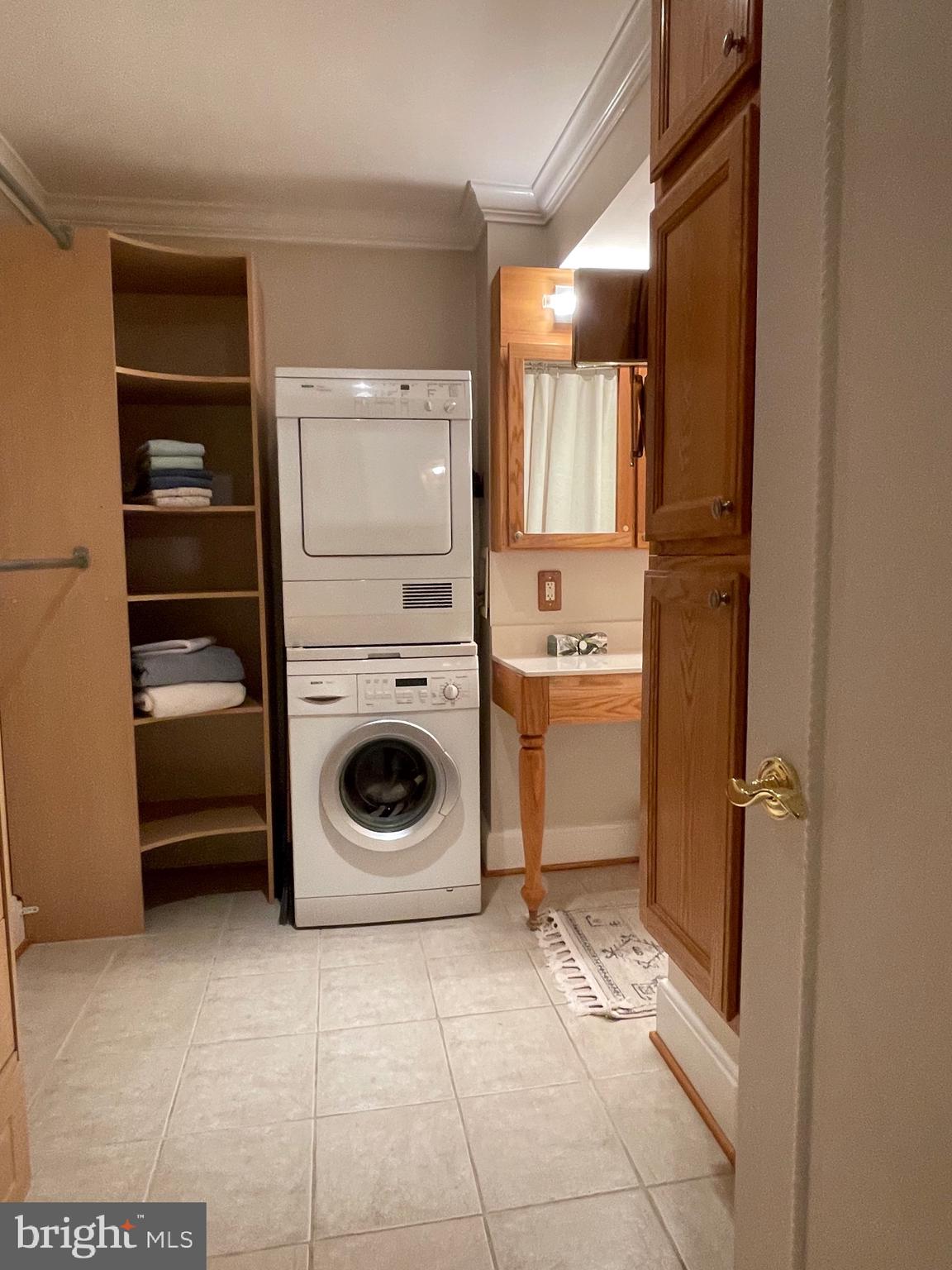 520 N Street Southwest, Unit S618 Washington, DC 20024 - Photo 20 of 62 a utility room with dryer and washer