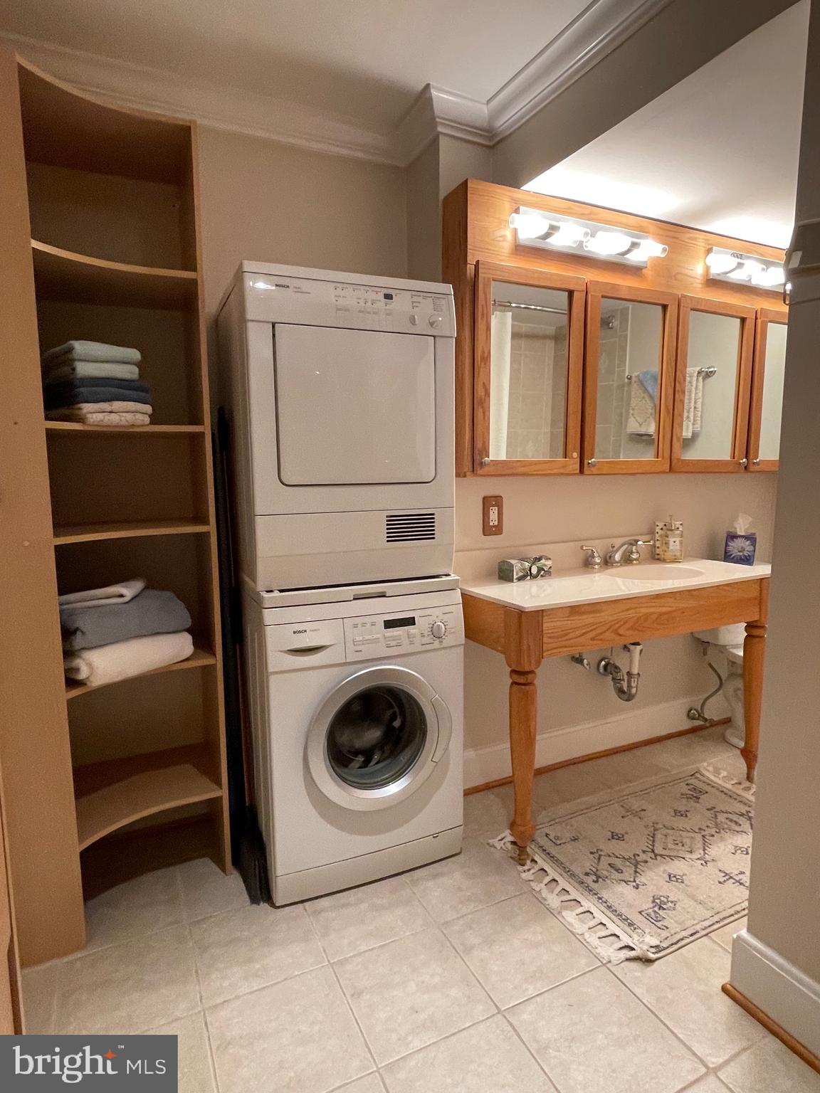 520 N Street Southwest, Unit S618 Washington, DC 20024 - Photo 21 of 62 a utility room with dryer and washer