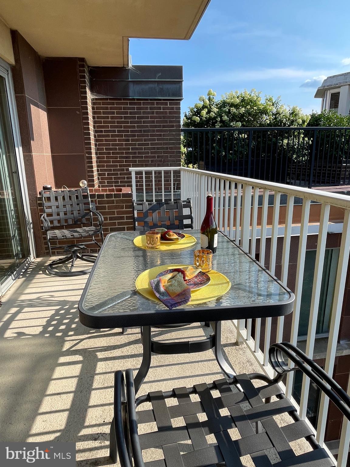 520 N Street Southwest, Unit S618 Washington, DC 20024 - Photo 26 of 62 a view of a chairs and table on the deck