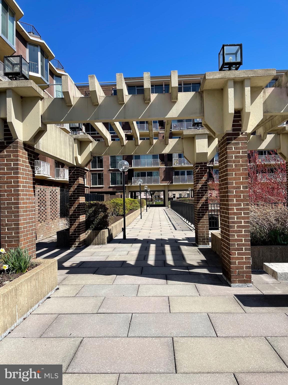 520 N Street Southwest, Unit S618 Washington, DC 20024 - Photo 32 of 62 a view of a white building with many windows