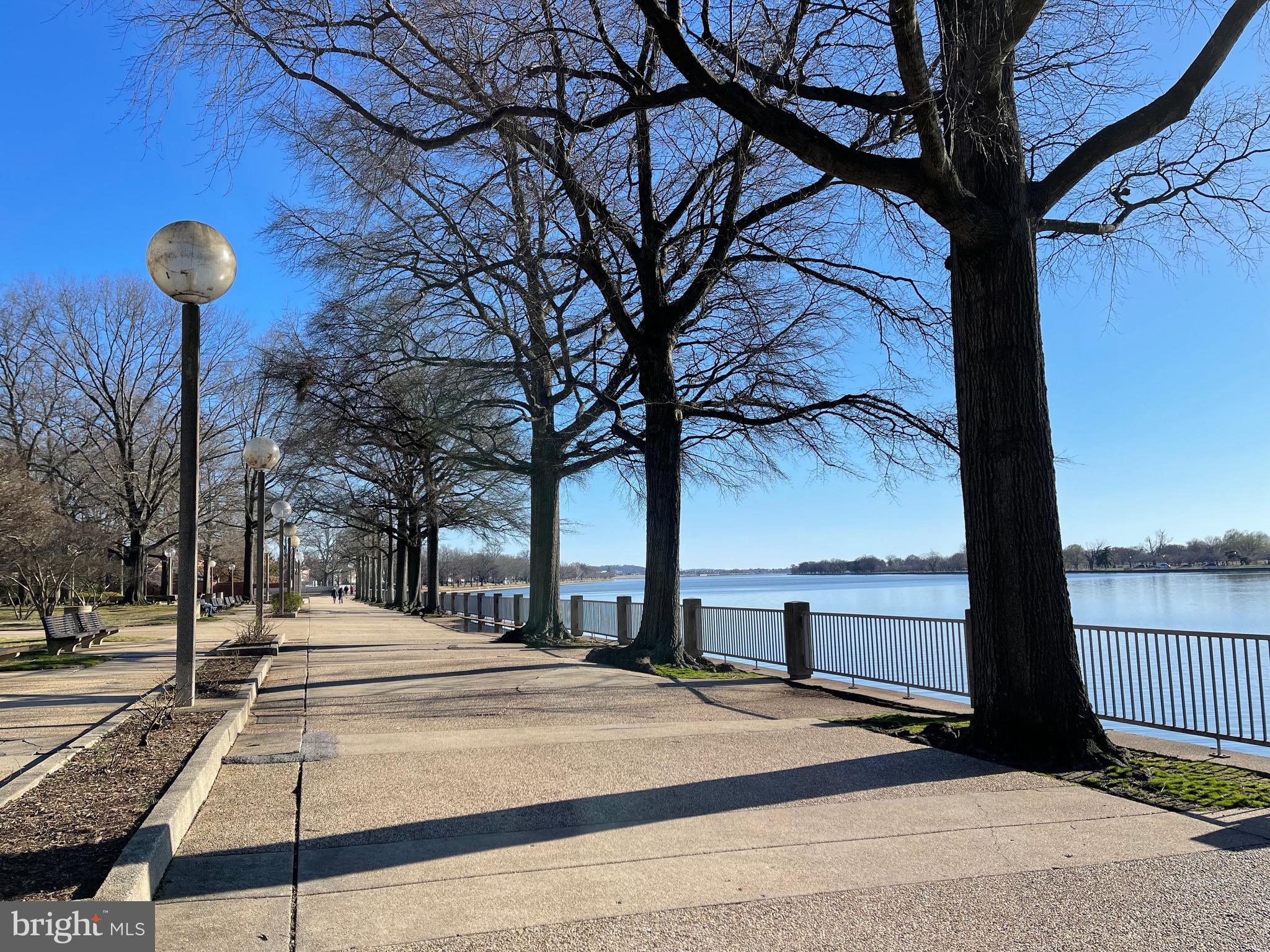 520 N Street Southwest, Unit S618 Washington, DC 20024 - Photo 47 of 62 a view of a pathway with a wrought fence