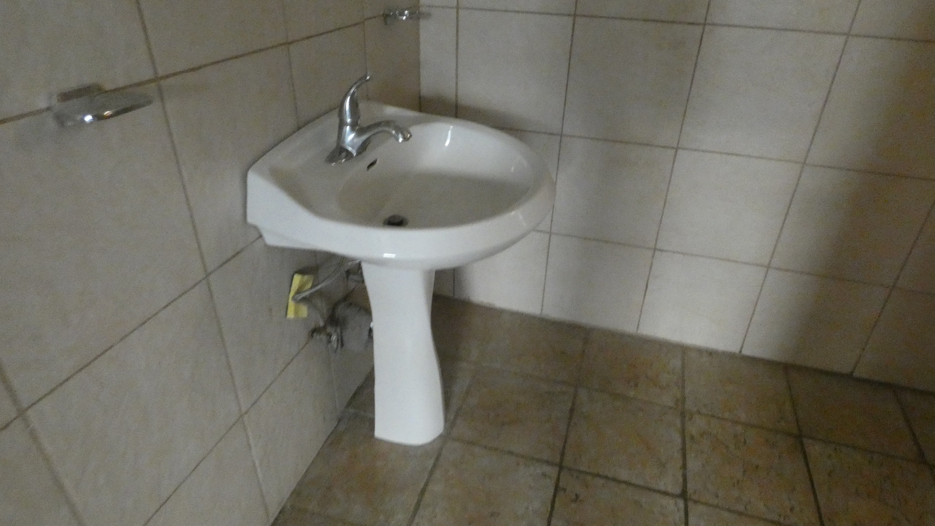 1707 East 83rd Street Chicago, IL 60617 - Photo 4 of 15 a bathroom with a sink