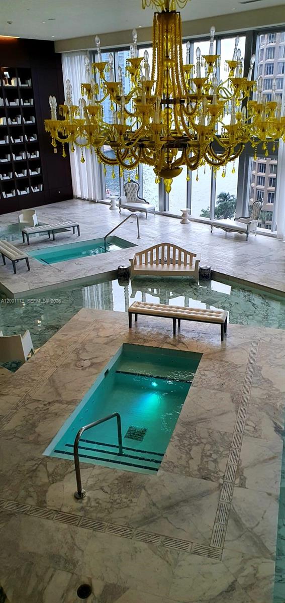 475 Brickell Avenue, Unit 2115 Miami, FL 33131 - Photo 20 of 21 a view of building with a swimming pool