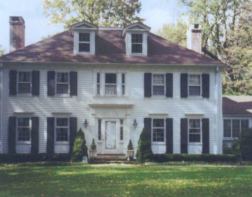 3051 Bronson Road Fairfield, CT 06824 - Photo 1 of 1 a front view of a house with a yard and green space