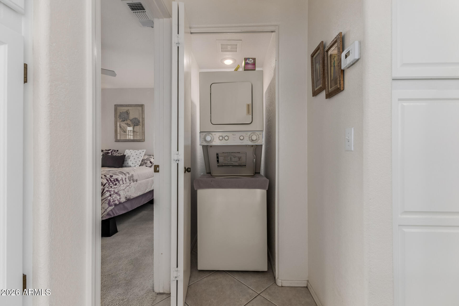 14300 West Bell Road, Unit 311 Surprise, AZ 85374 - Photo 18 of 50 a view of hallway with washer and dryer