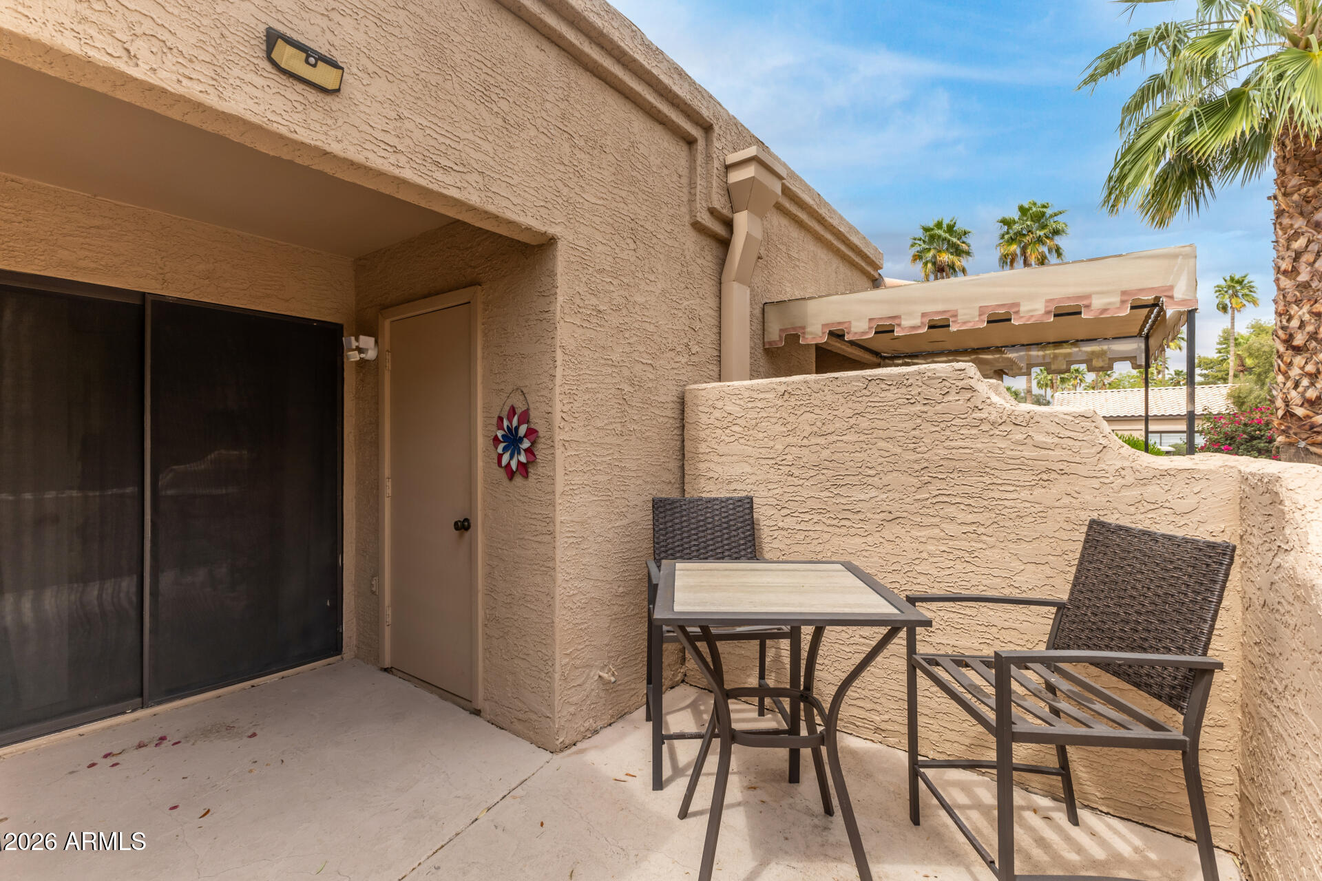 14300 West Bell Road, Unit 311 Surprise, AZ 85374 - Photo 21 of 50 a view of an outdoor seating