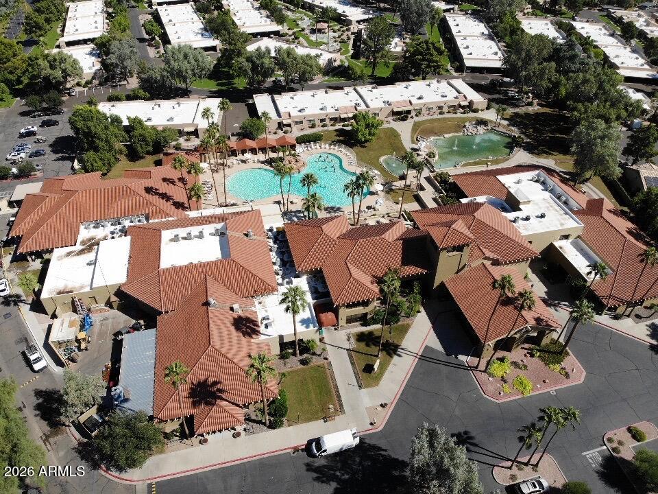 14300 West Bell Road, Unit 311 Surprise, AZ 85374 - Photo 49 of 50 an aerial view of residential houses with outdoor space