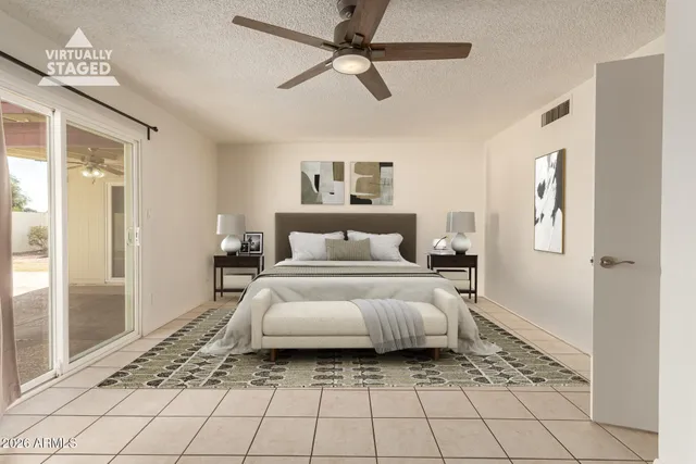a view of a house with a backyard and a garage
