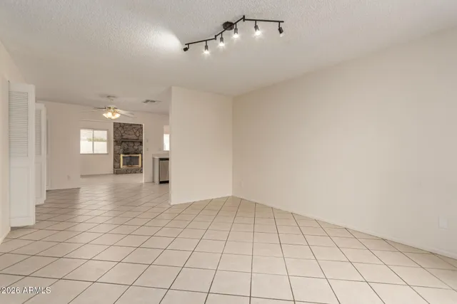 a view of an empty room and window