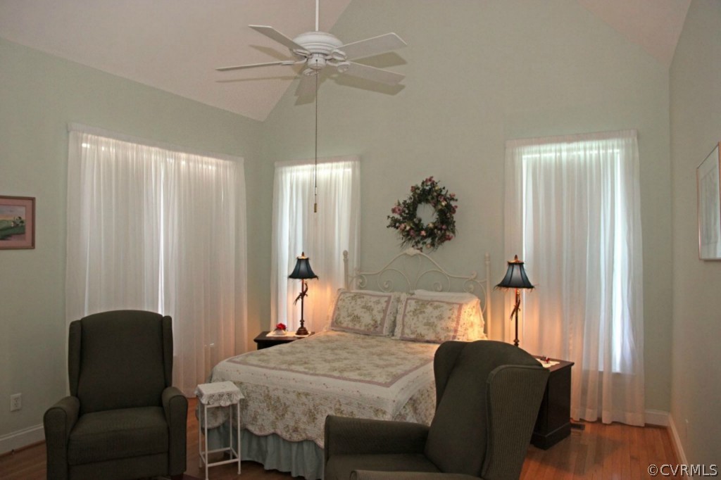 14900 Beach Road Chesterfield, VA 23838 - Photo 16 of 19 a living room with furniture a chandelier and a window