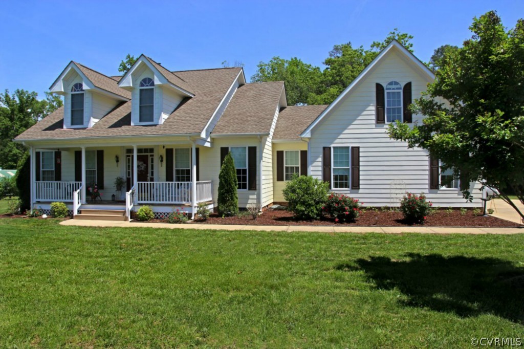 14900 Beach Road Chesterfield, VA 23838 - Photo 2 of 19 a front view of a house with a yard