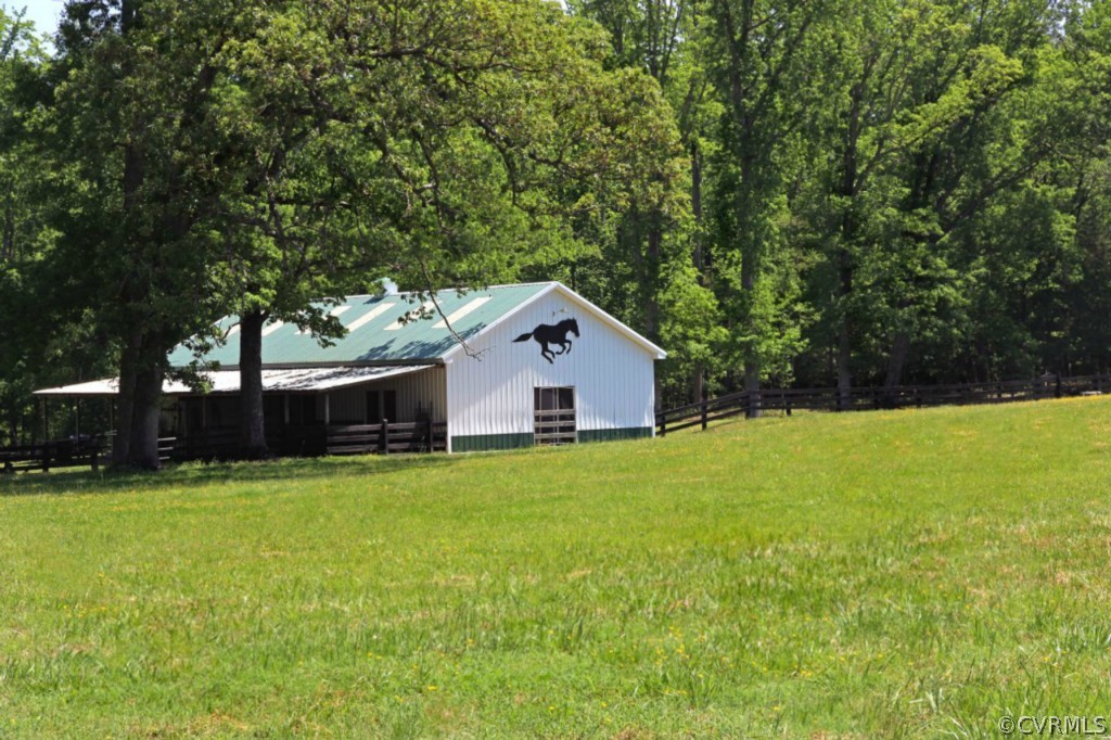 14900 Beach Road Chesterfield, VA 23838 - Photo 8 of 19 a house with a yard