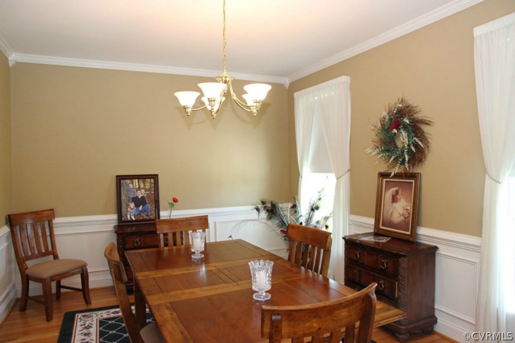 14900 Beach Road Chesterfield, VA 23838 - Photo 9 of 19 a view of a dining room with furniture and chandelier