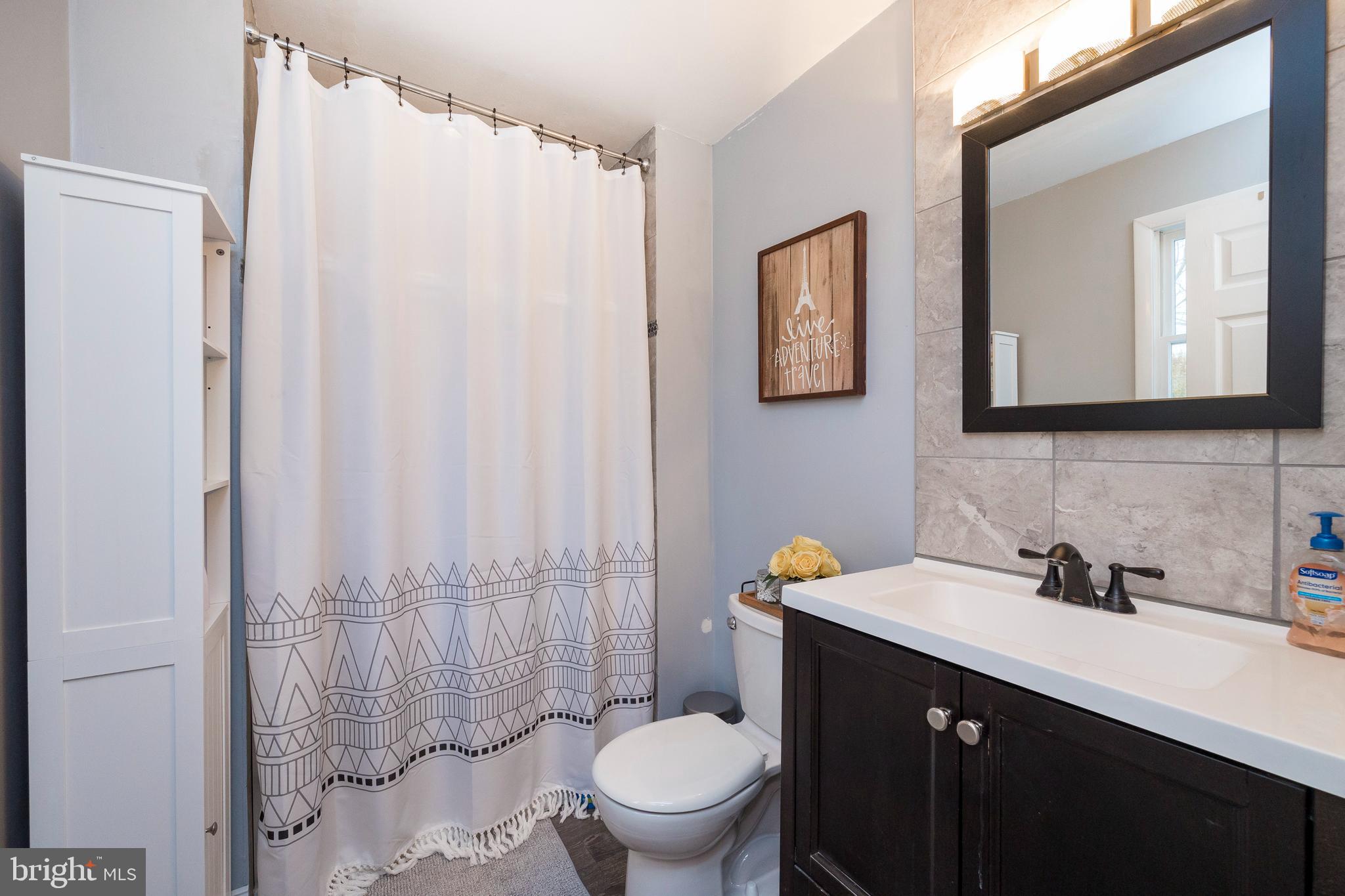 1207 Woodmere Road Pottstown, PA 19464 - Photo 22 of 48 Upper Level Main Bathroom 1