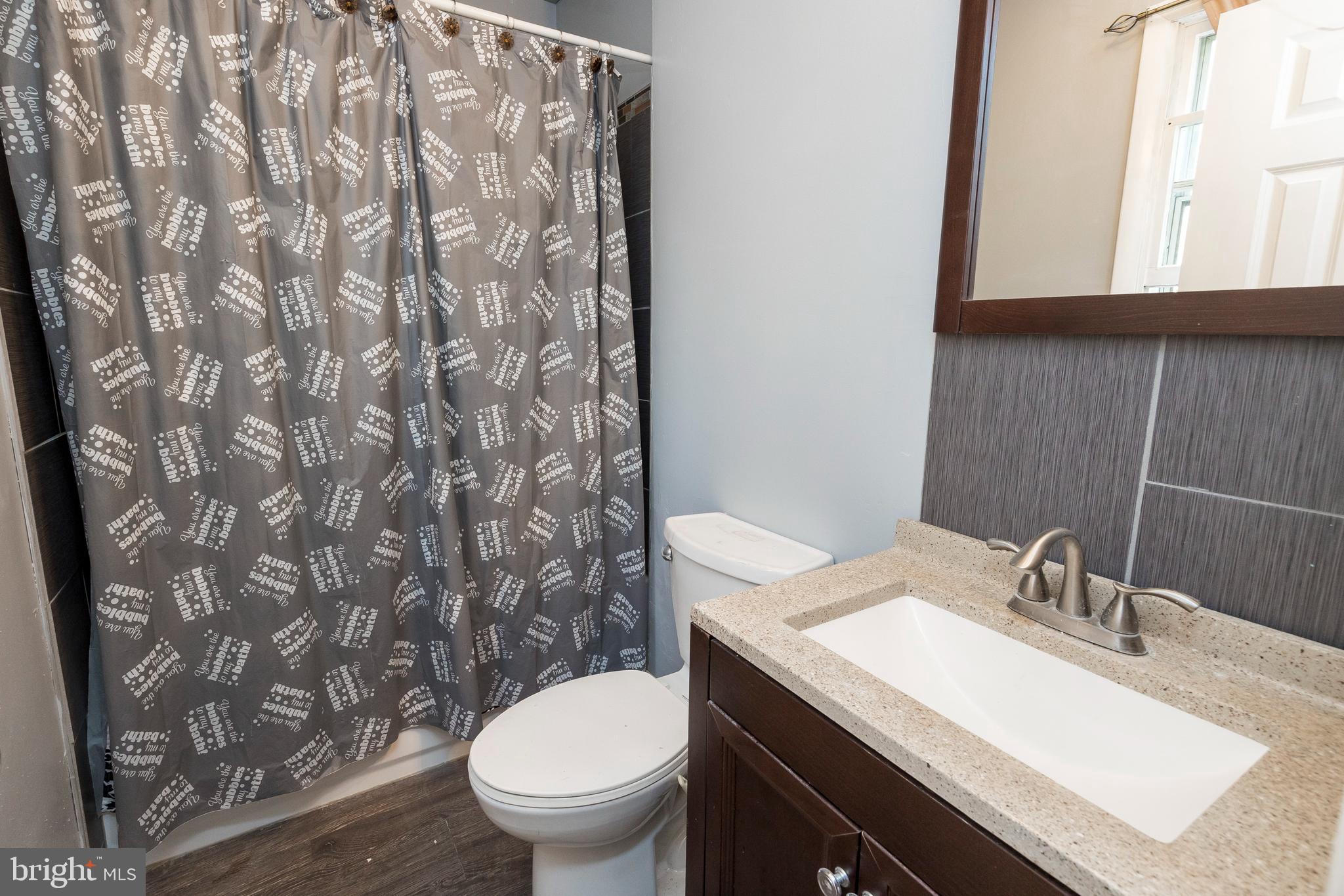 1207 Woodmere Road Pottstown, PA 19464 - Photo 9 of 48 Lower Level Main Bathroom