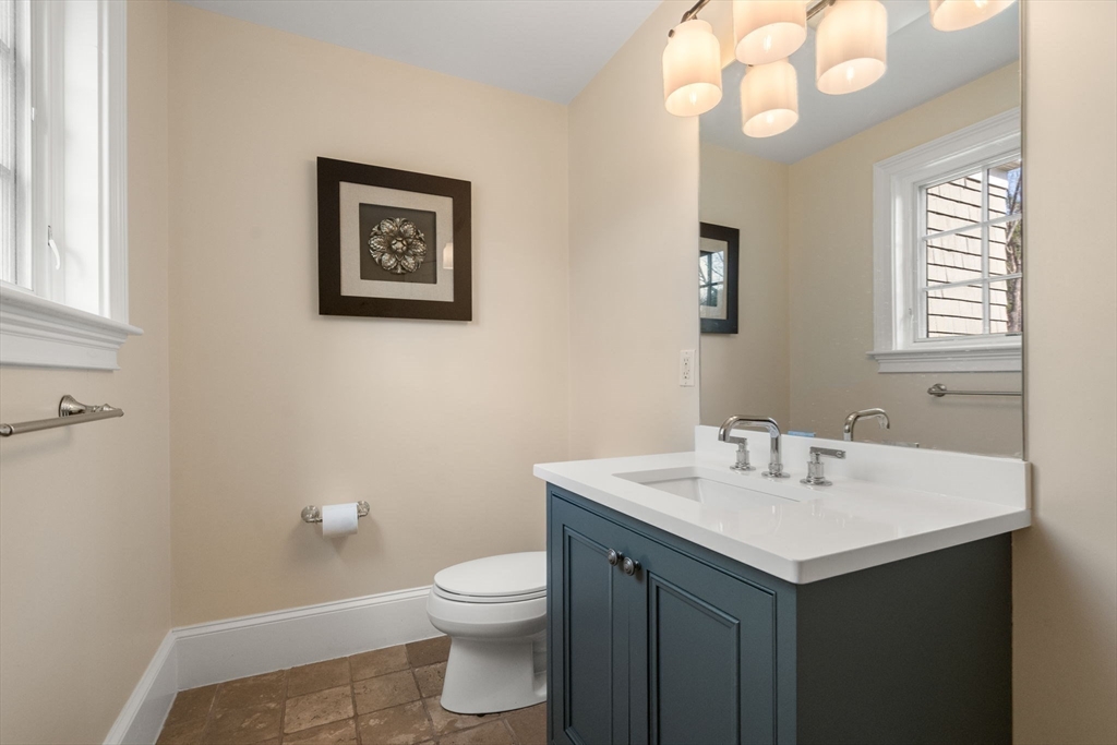21 Westerly Road Weston, MA 02493 - Photo 14 of 38 a bathroom with a sink vanity and a toilet