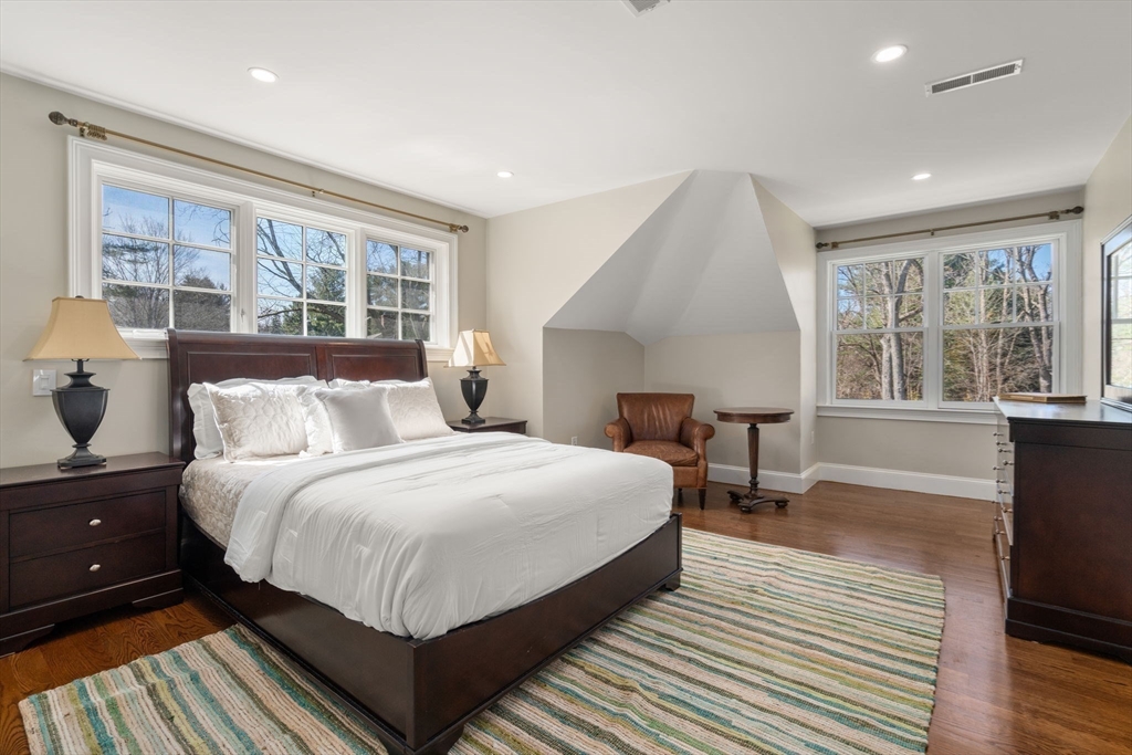 21 Westerly Road Weston, MA 02493 - Photo 20 of 38 a large bedroom with bed and large window