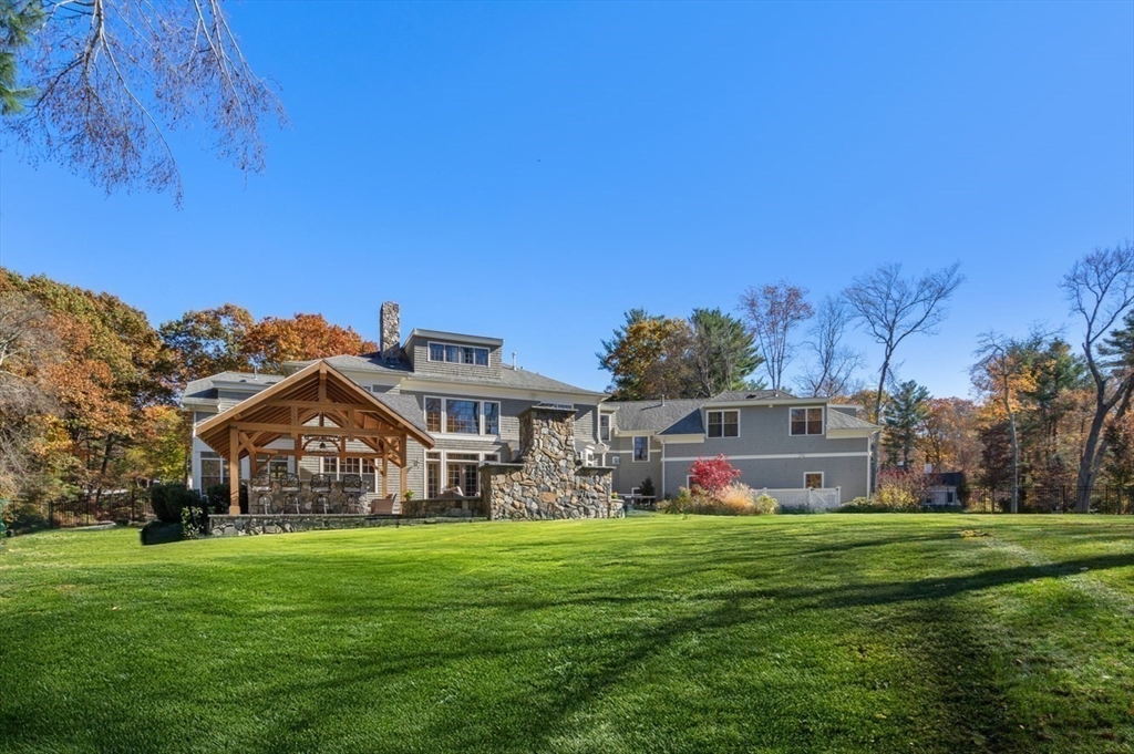 21 Westerly Road Weston, MA 02493 - Photo 2 of 38 a view of a big house with a big yard