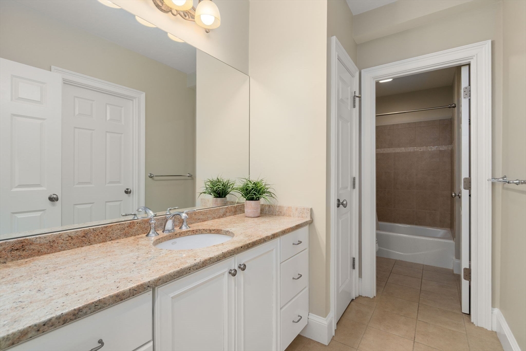 21 Westerly Road Weston, MA 02493 - Photo 21 of 38 a bathroom with a sink and a mirror