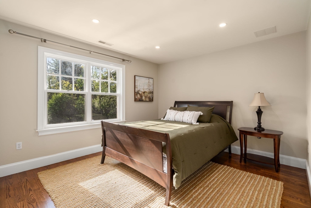 21 Westerly Road Weston, MA 02493 - Photo 25 of 38 a bedroom with a bed and a window
