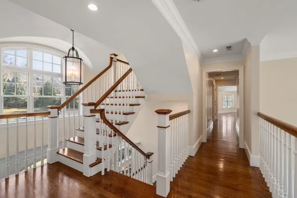 a view of entryway with wooden floor