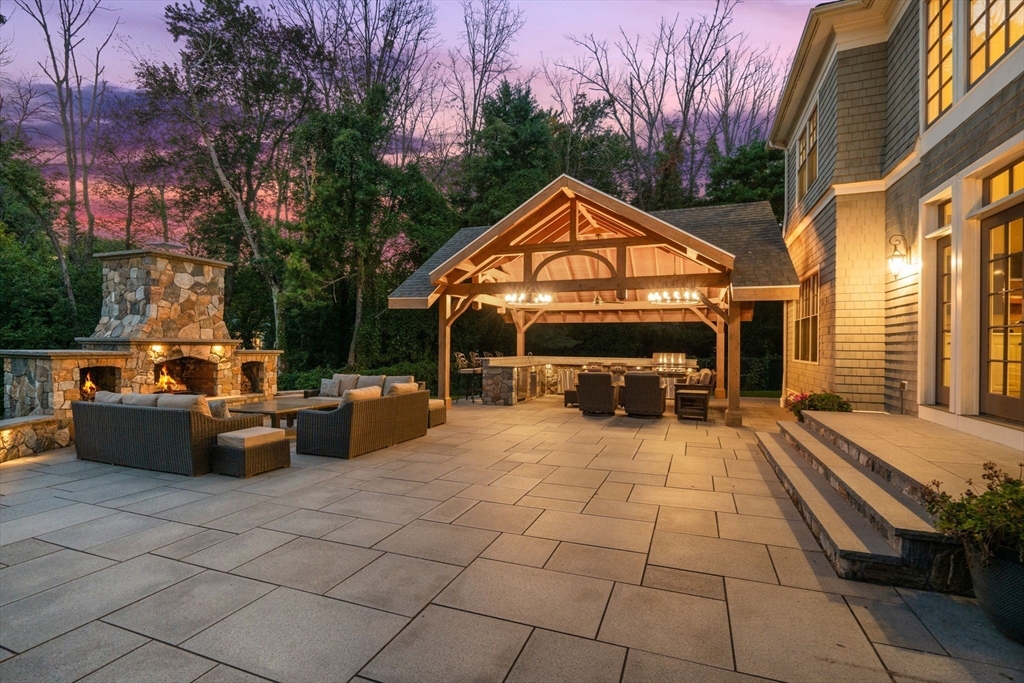 21 Westerly Road Weston, MA 02493 - Photo 38 of 38 a view of a patio with couches and a fire pit