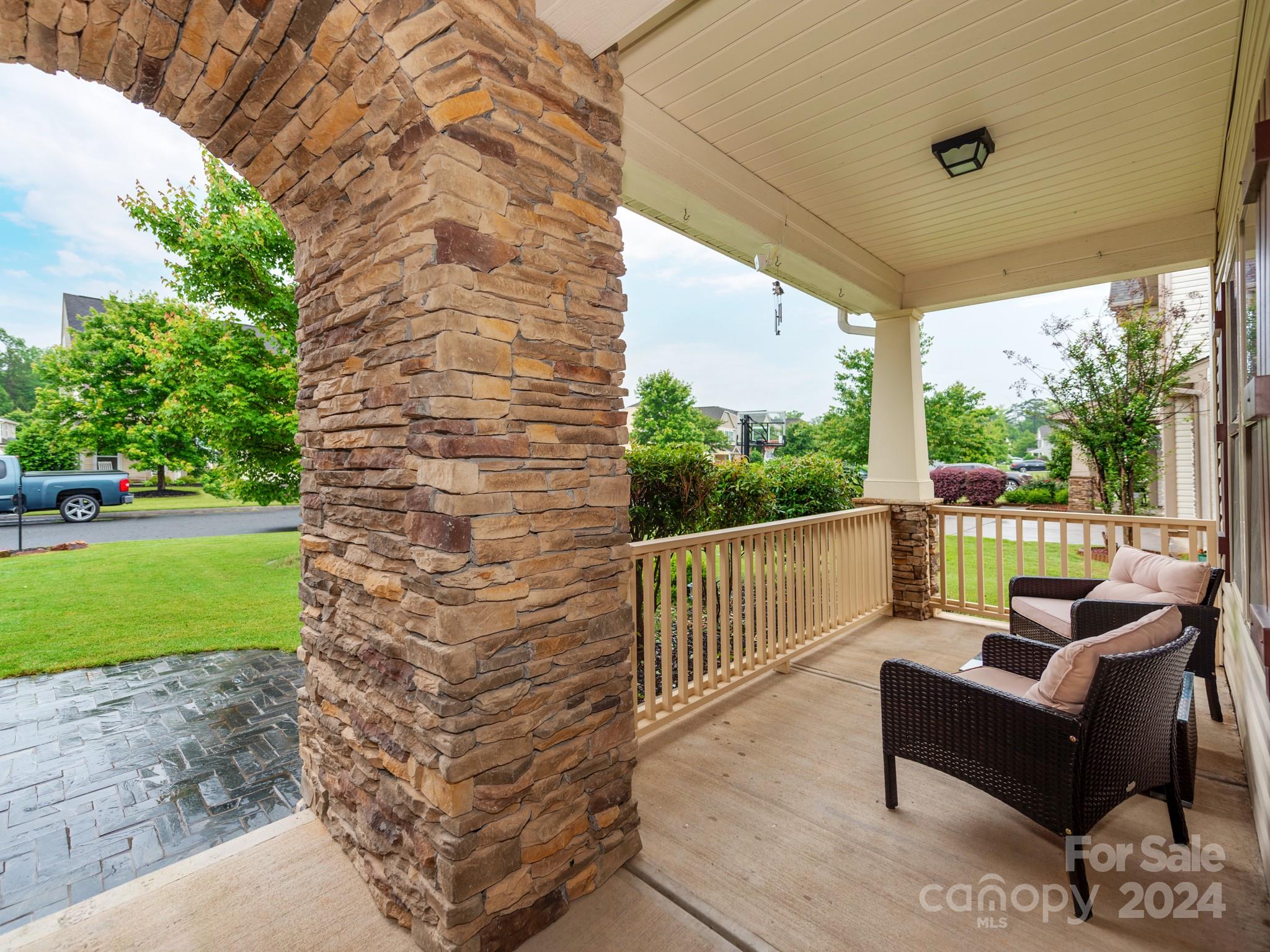 8080 Bryson Road Indian Land, SC 29707 - Photo 3 of 38 a balcony with couple of chairs and a couch