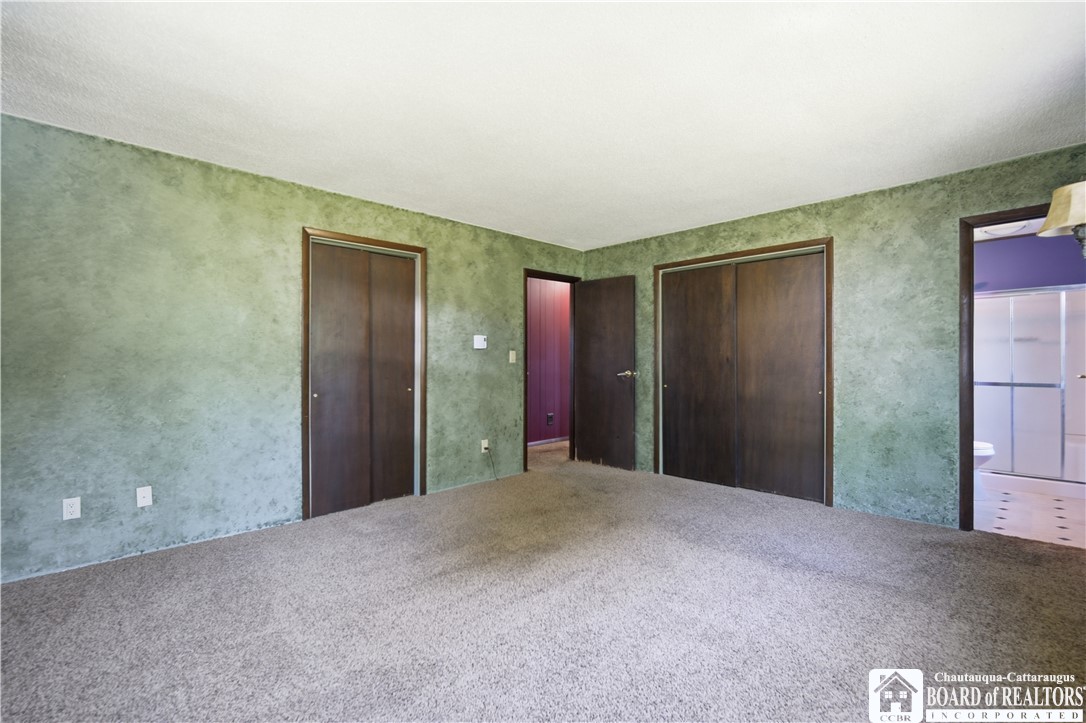 425 Brigham Road Dunkirk, NY 14048 - Photo 26 of 31 The primary bedroom has two closets and an ensuite