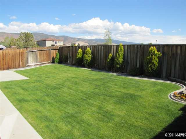 1670 Cattlemen Court Reno, NV 89521 - Photo 10 of 12 a view of a backyard with pathway