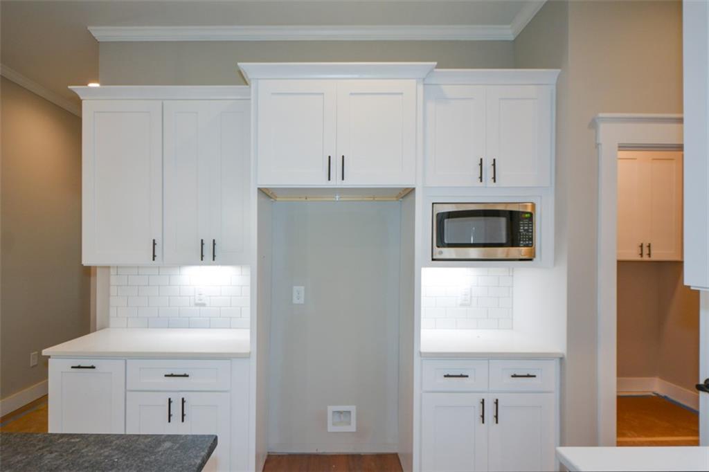 171 Field Stone Circle Jasper, GA 30143 - Photo 13 of 71 a kitchen with cabinets stainless steel appliances and a window
