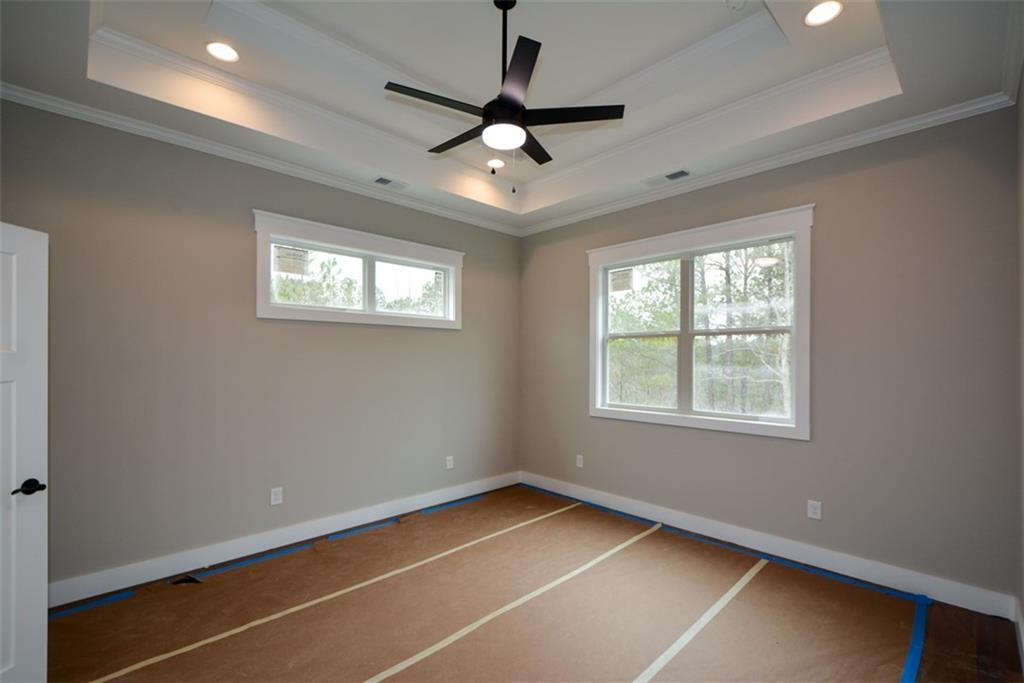 171 Field Stone Circle Jasper, GA 30143 - Photo 21 of 71 a room with window and ceiling fan