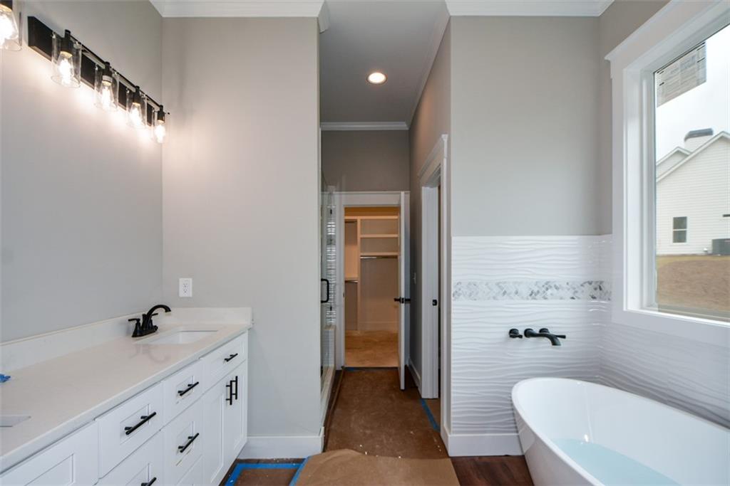 171 Field Stone Circle Jasper, GA 30143 - Photo 24 of 71 a bathroom with a sink a toilet and shower