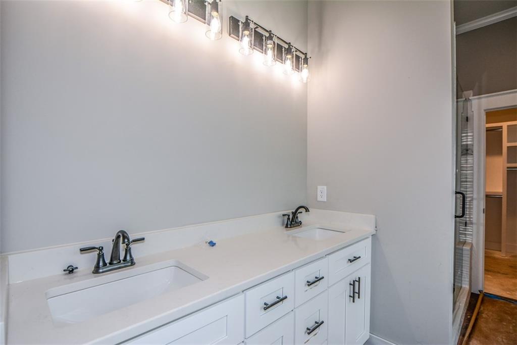 171 Field Stone Circle Jasper, GA 30143 - Photo 25 of 71 a bathroom with a sink and a mirror