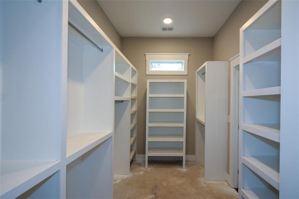 171 Field Stone Circle Jasper, GA 30143 - Photo 31 of 71 a view of walk in closet with empty racks