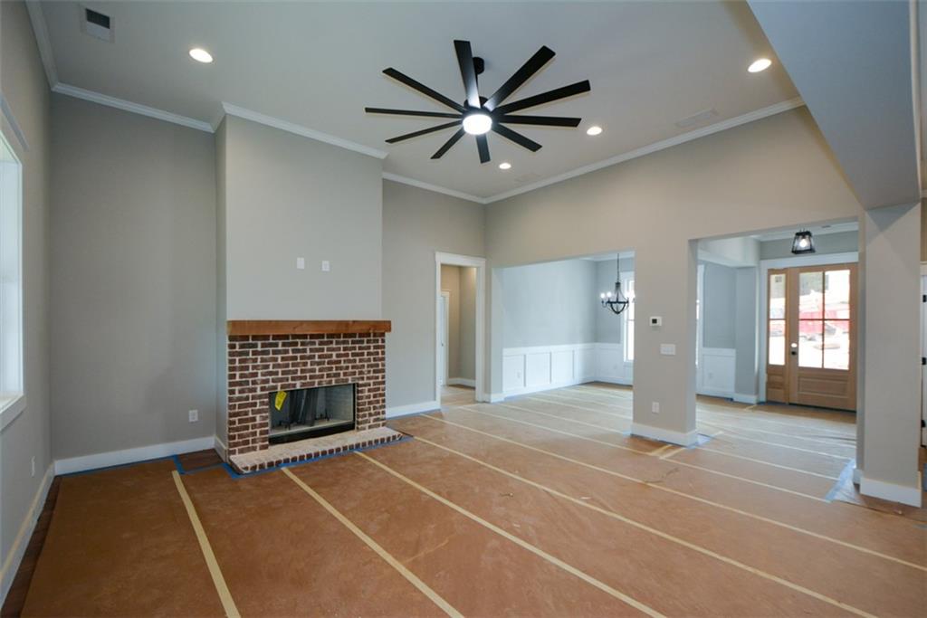 171 Field Stone Circle Jasper, GA 30143 - Photo 35 of 71 a view of an empty room with a ceiling fan and window
