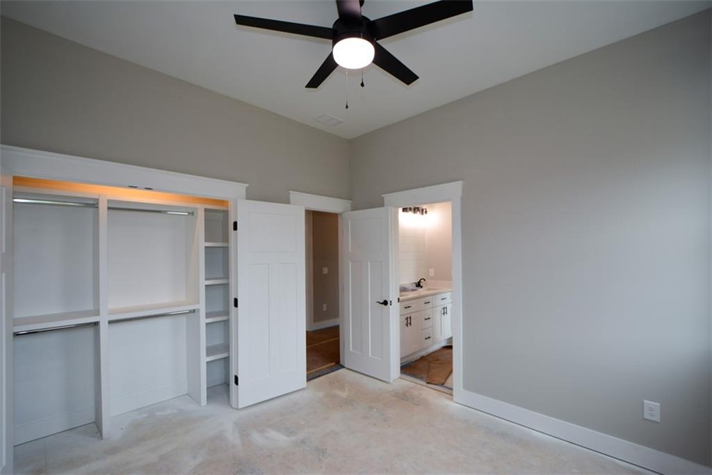 171 Field Stone Circle Jasper, GA 30143 - Photo 42 of 71 a view of empty room with cabinet and ceiling fan