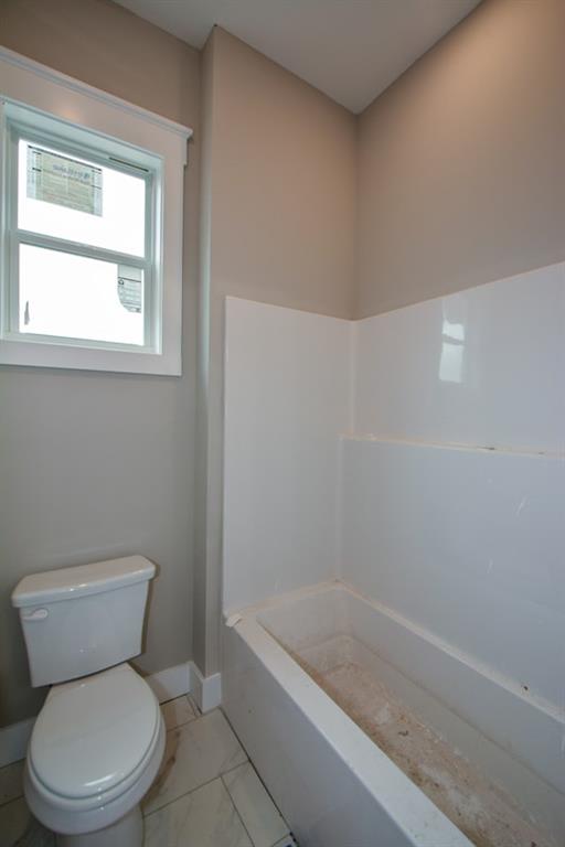 171 Field Stone Circle Jasper, GA 30143 - Photo 49 of 71 a white toilet sitting next to a bath tub