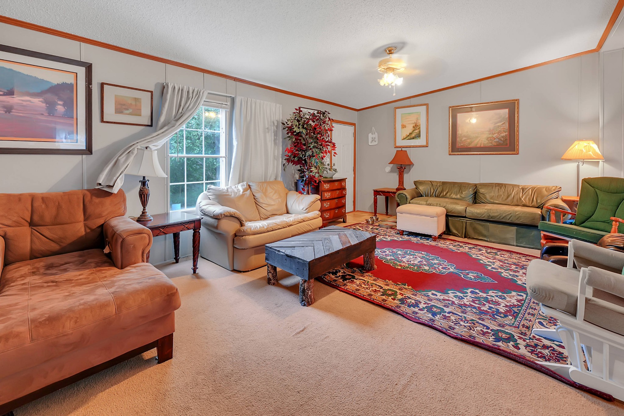 1241 Quarry Road Mount Juliet, TN 37122 - Photo 12 of 29 a living room with furniture a rug and a lamp
