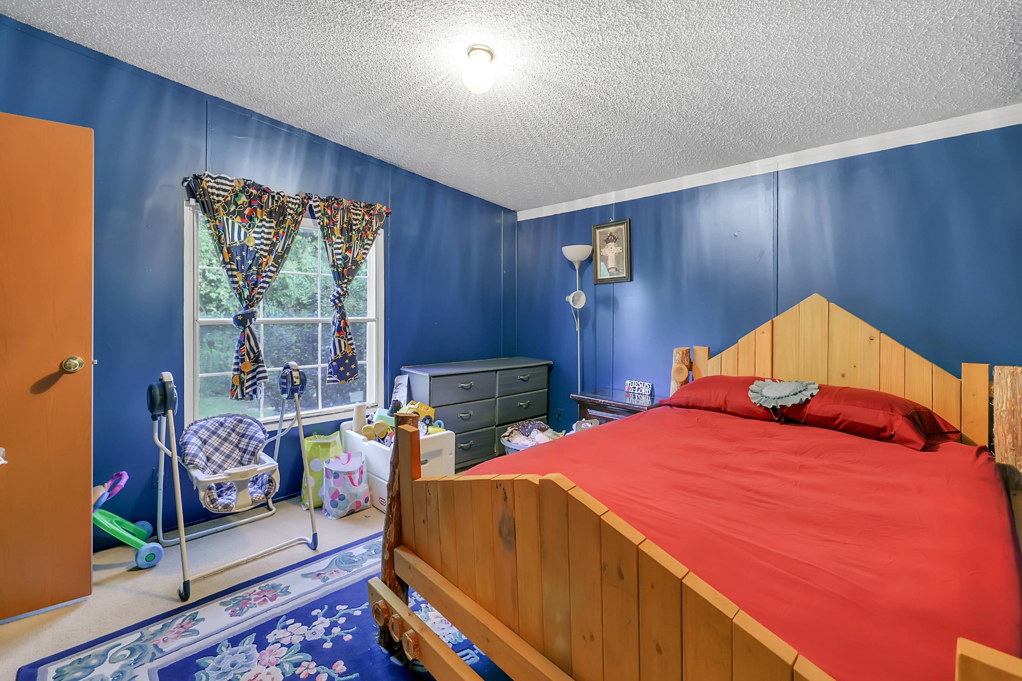 1241 Quarry Road Mount Juliet, TN 37122 - Photo 20 of 29 a bedroom with a bed and large windows