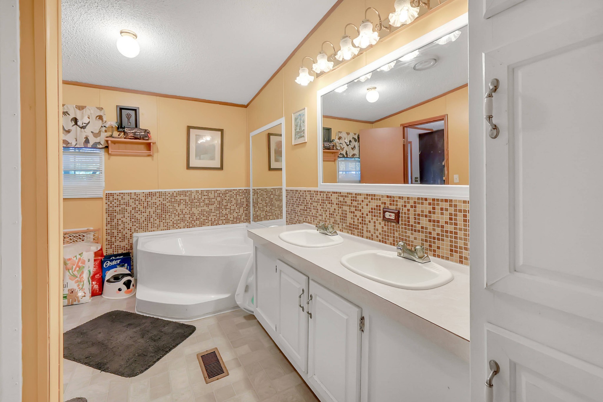1241 Quarry Road Mount Juliet, TN 37122 - Photo 23 of 29 a bathroom with a sink a toilet and shower