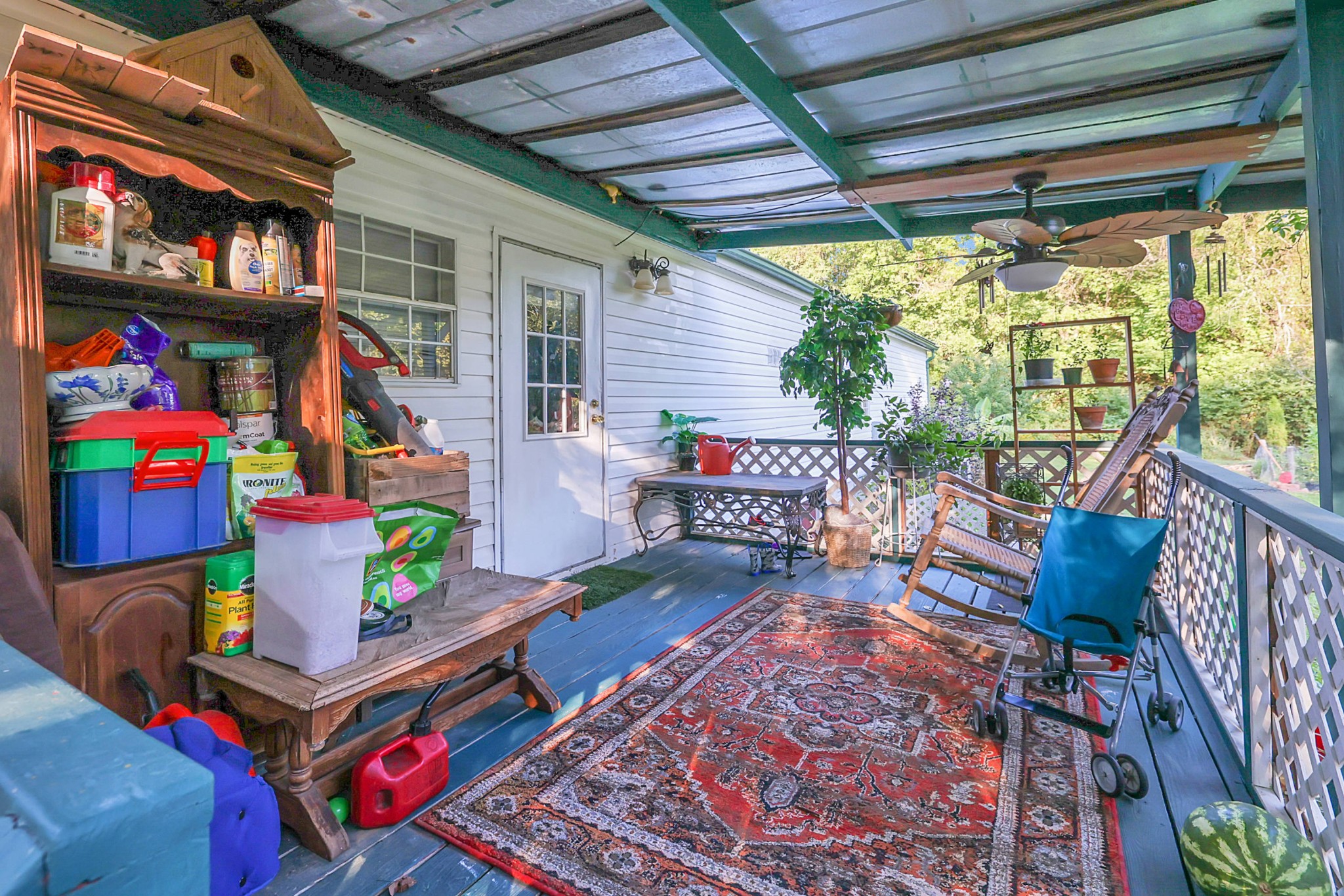 1241 Quarry Road Mount Juliet, TN 37122 - Photo 5 of 29 a outdoor living space with furniture and a rug