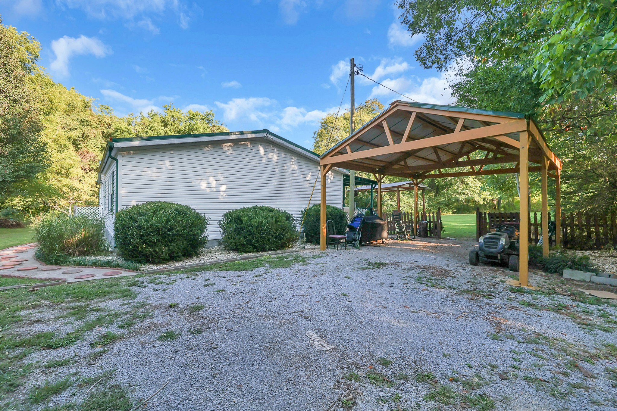 1241 Quarry Road Mount Juliet, TN 37122 - Photo 7 of 29 a view of a house with backyard and trees